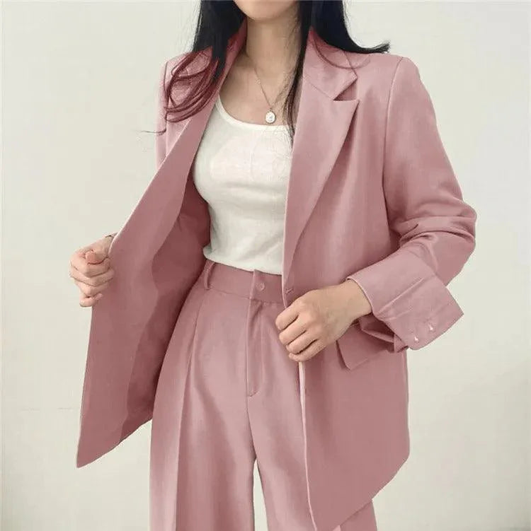 Kvinders Jakkesæt med Oversize Blazer og Højtaljede Bukser 1