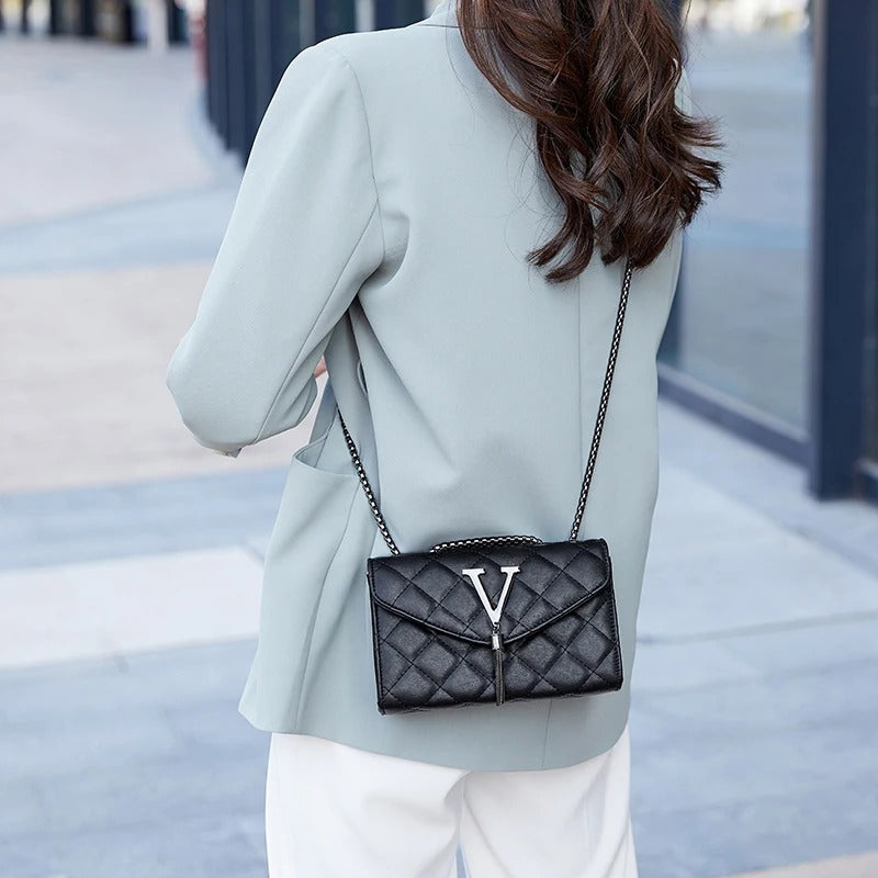 Luksus quiltet crossbody-taske med kvast